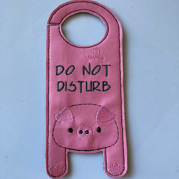 828. Pig door hanger