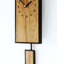 Rectangular Pendulum Wall Clock in Olive Wood and Old Ebony with Inlaid Squares - Image 2