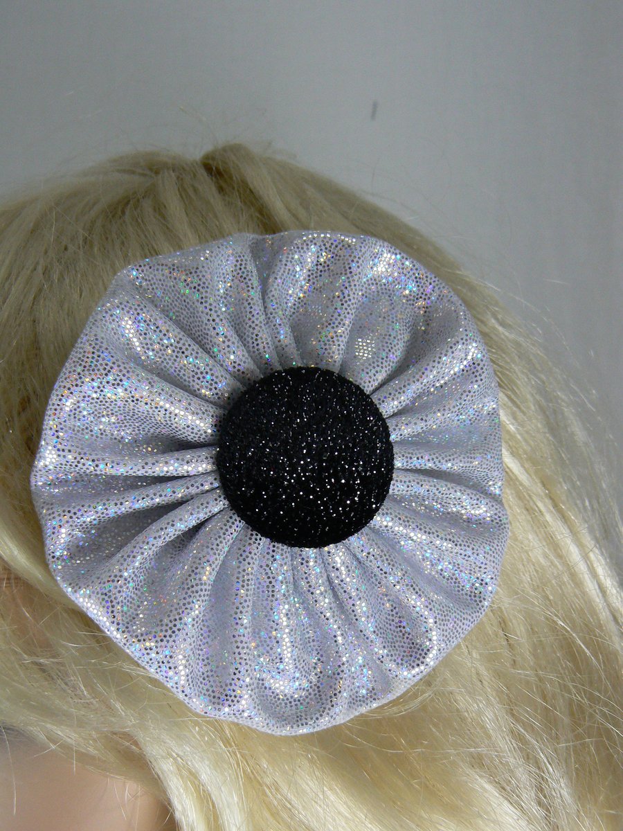 Silver hologram yo yo hair clip with black button