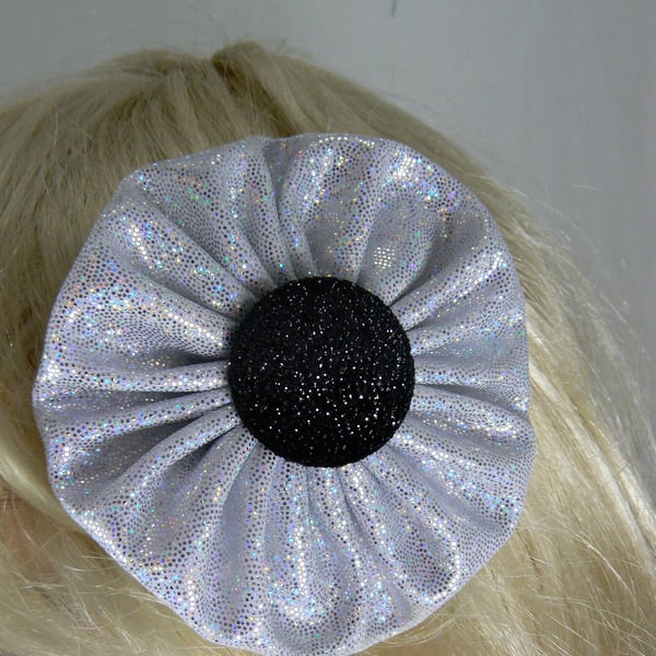 Silver hologram yo yo hair clip with black button