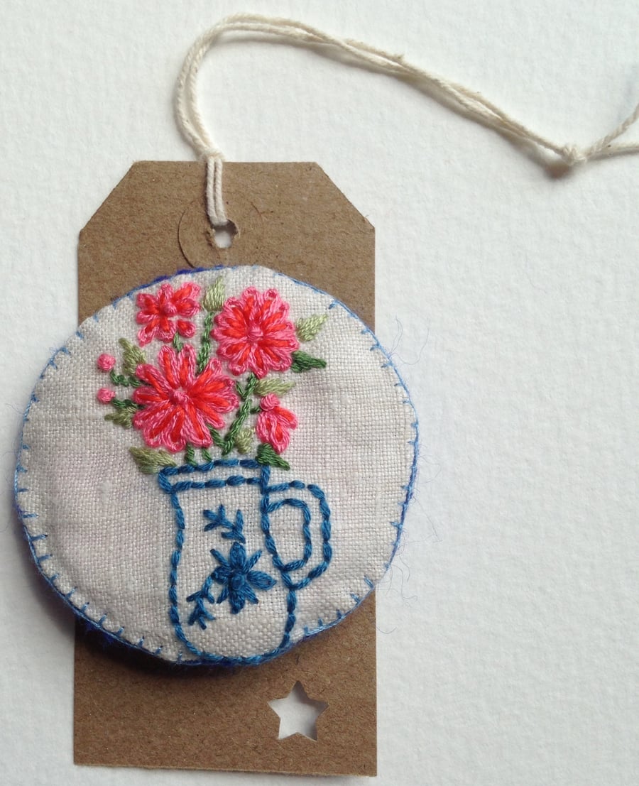 Embroidered linen brooch