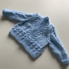 Hand knitted new born baby cardigan