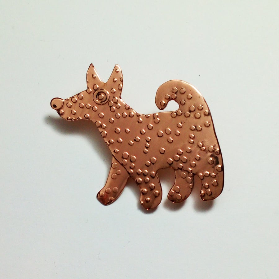 copper dog brooch