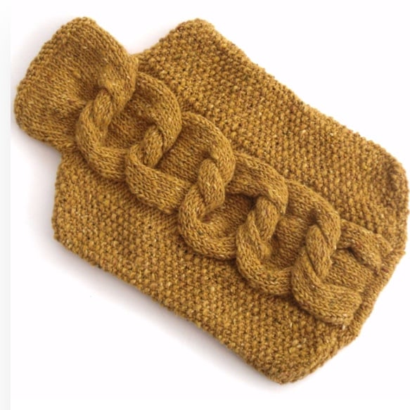Knitting Pattern for a cable knotted hot water bottle cover 