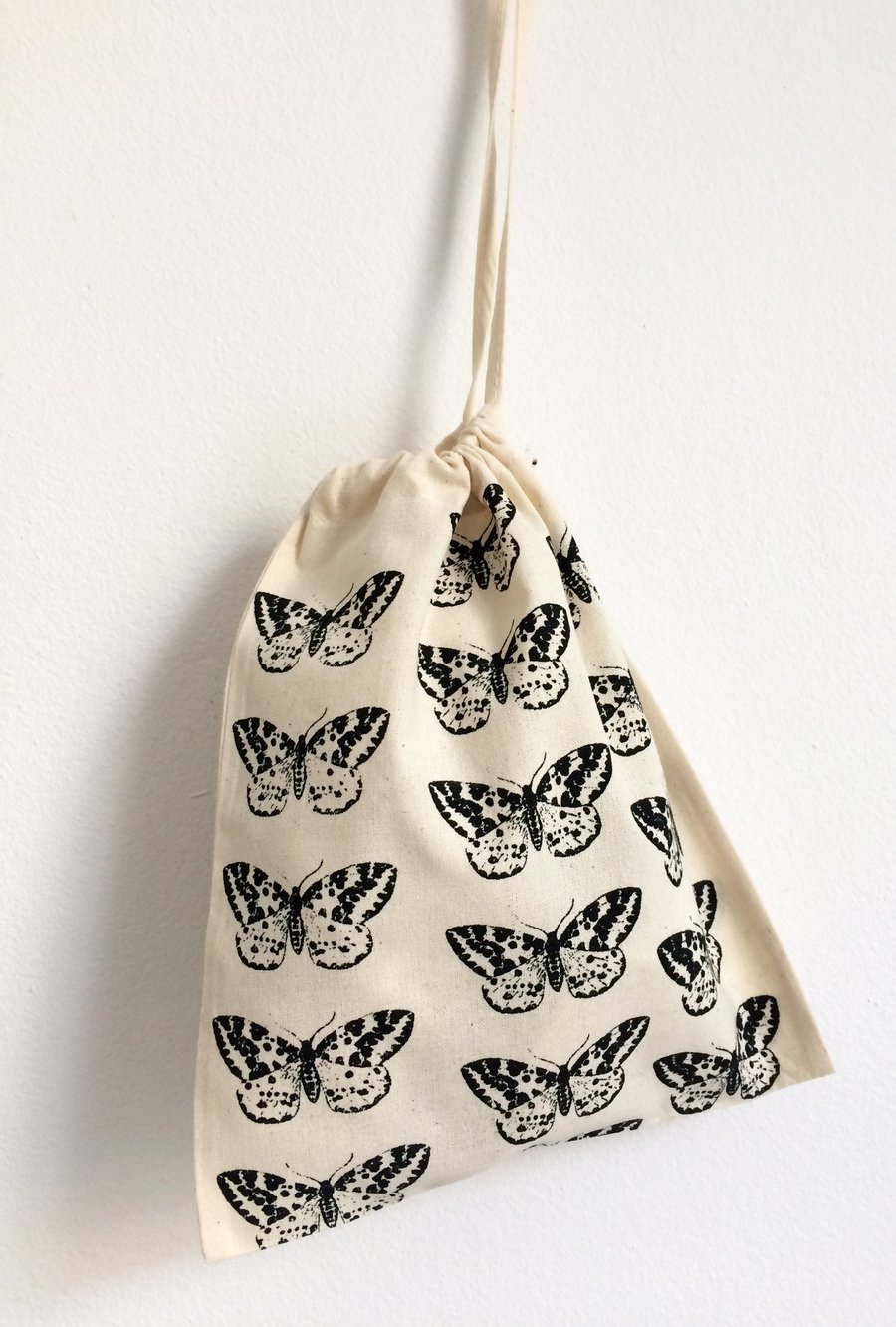 Moth pattern hand printed cotton drawstring small storage bag 