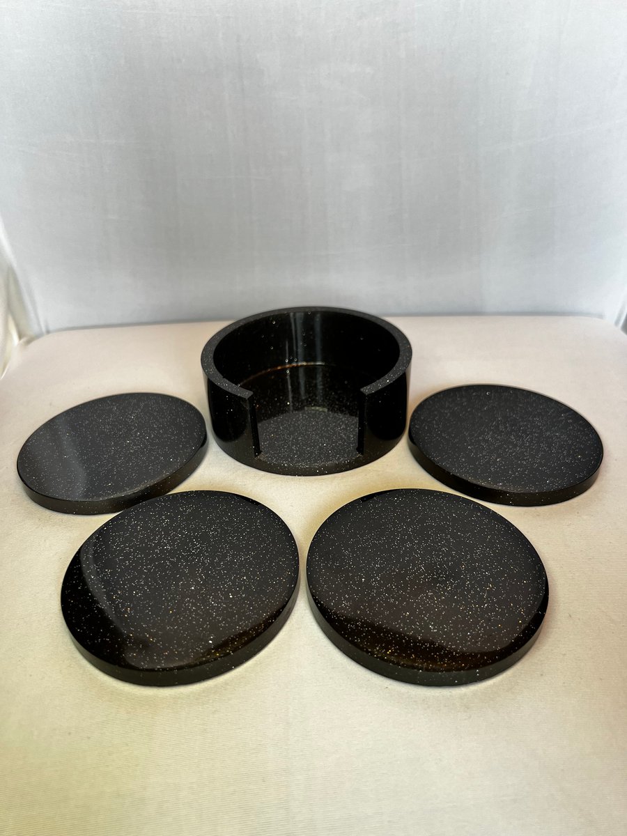 Set of 4 black with silver glitter coasters and holder.