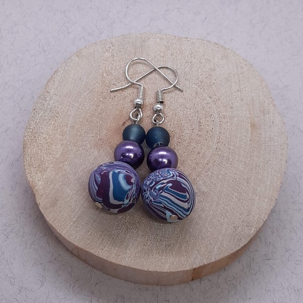 Teal and purple dangly polymer clay earrings