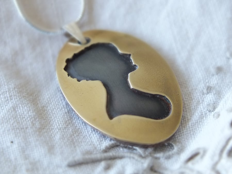 Jane Austen copper and brass pendant