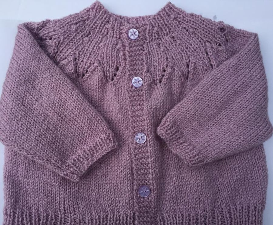 Hand knitted baby girls cardigan in Pink