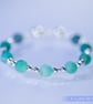 Beaded bracelet with crackle glass and sterling silver green blue stretchy - Image 5