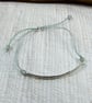 Sterling Silver Slim Bar Bracelet. Engraved Love you Millions on Waxed Cotton - Image 9