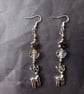 Wintry beaded star and leaf dangle earrings with silver stag charm  - Image 5
