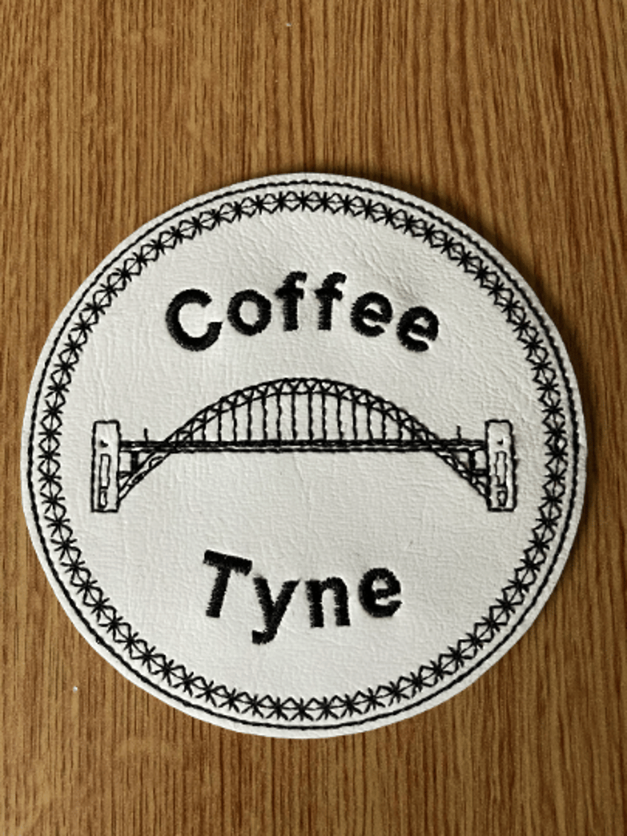 1105. Coffee Tyne star border round coaster.