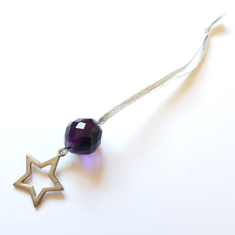 Antique silver coloured star and purple glass bead decoration