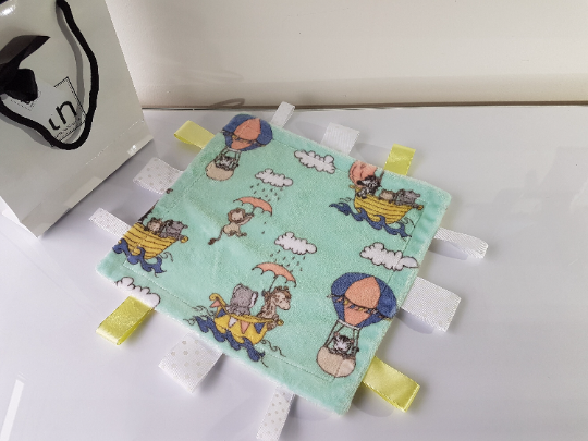 Introducing the Plush Ark Small Comfort Blanket with Ribbons 