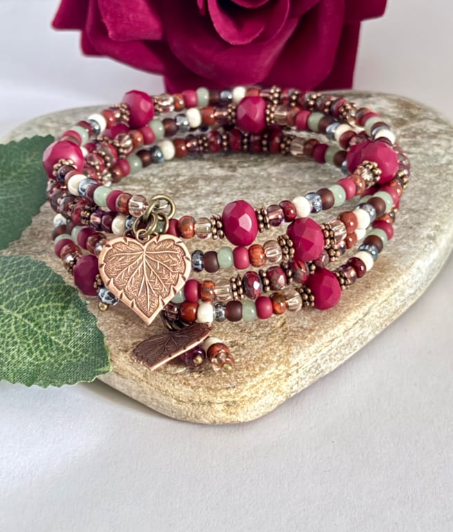 Deep red handmade Czech glass memory wire wrap bracelet with leaf charms