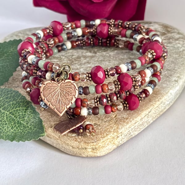 Deep red handmade Czech glass memory wire wrap bracelet with leaf charms