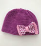 Hand knitted baby cloche hat with bow - Image 1