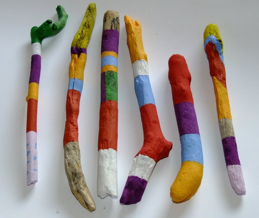Colourful driftwood hand painted vase fillers, ideal for decorating a room.