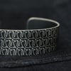 Geometric fox pattern cuff bracelet dark grey