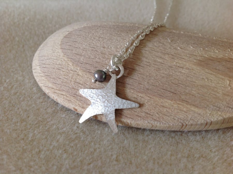Sterling silver textured Starfish and white or grey Pearl charm pendant necklace
