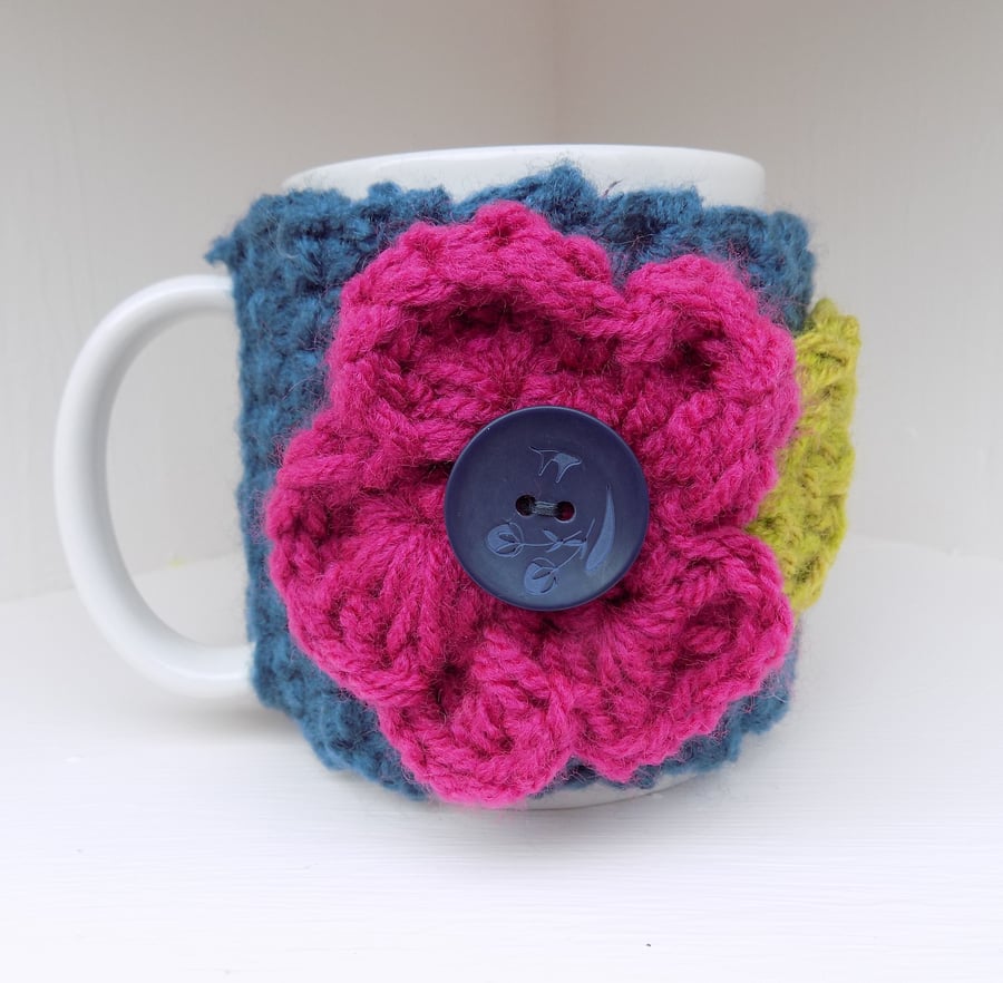Mug with Chunky Hug Cosy with Large Crochet Flower Winter Berry Colours