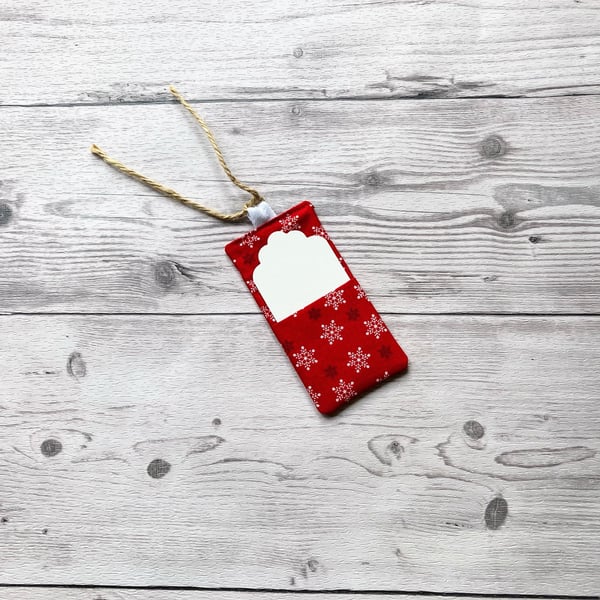 Snowflake Christmas themed red cotton fabric gift tags with card.
