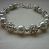 WHITE PEARLS AND SILVER GLITTER BALL BRACELET.  452