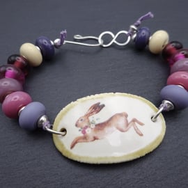 ceramic hare bracelet, purple and pink lampwork glass jewellery