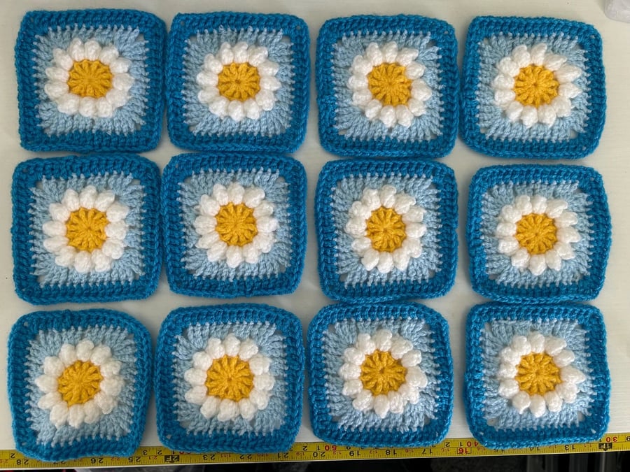 12 Hand Crocheted Daisy Granny squares Blues