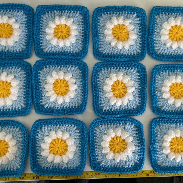 12 Hand Crocheted Daisy Granny squares Blues
