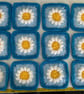 12 Hand Crocheted Daisy Granny squares Blues
