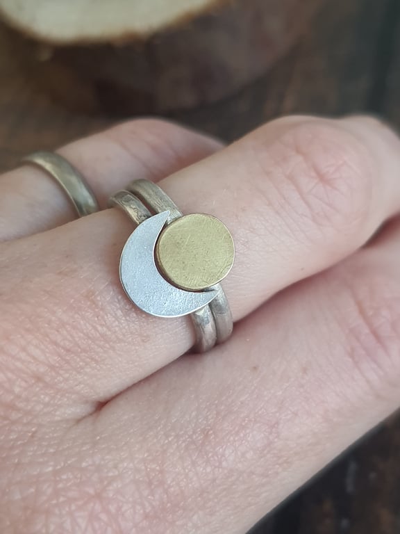 Sun and moon eclipse stacker rings in silver and brass