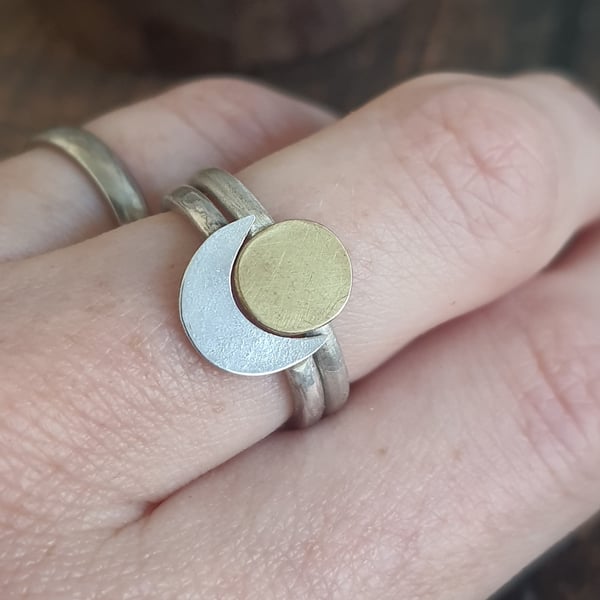 Sun and moon eclipse stacker rings in silver and brass