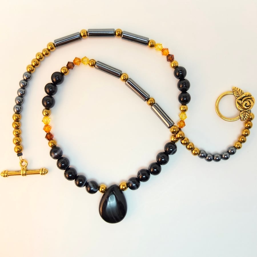 Black Sardonyx, Hematite And Swarovski Crystal Necklace With Teardrop Pendant.