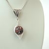 Unique wire wrapped leopardskin jasper gemstone necklace