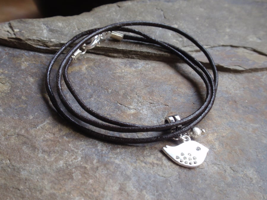 Dark brown leather wrap bracelet with silver plated bird charm