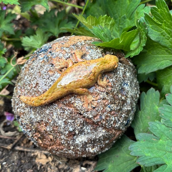Stoneware sphere with lizard