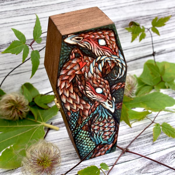 Dragons with egg coffin shaped box. Pyrography with colour.