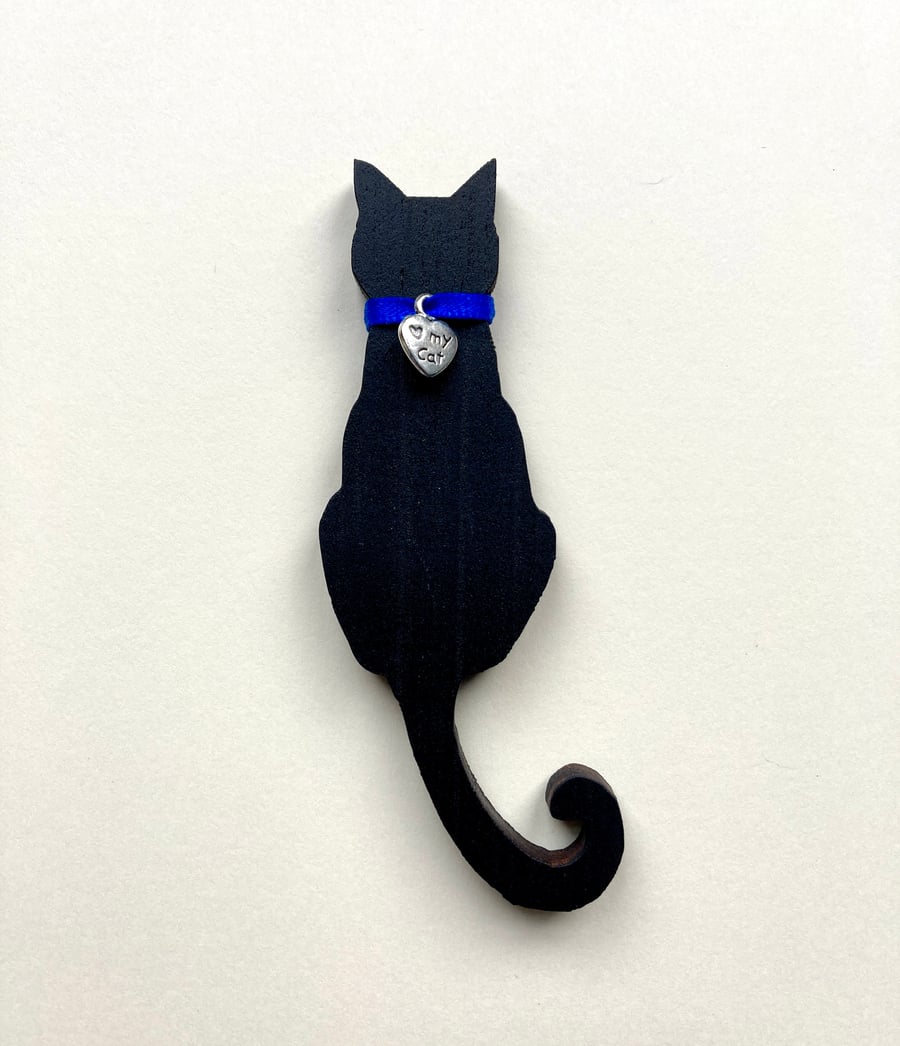 Handmade black cat fridge magnet.