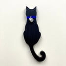 Handmade black cat fridge magnet.
