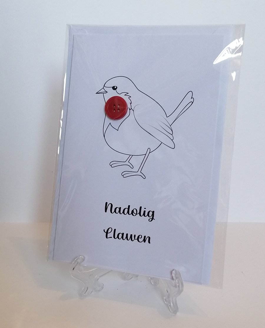 Nadolig Llawen (Merry Christmas) card with a red button on a Robin. 