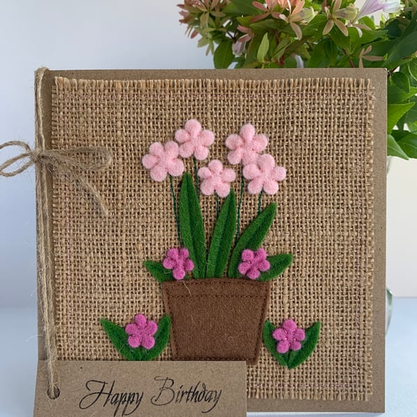 Handmade Birthday Card. A pot of pale pink and rose pink flowers from wool felt.