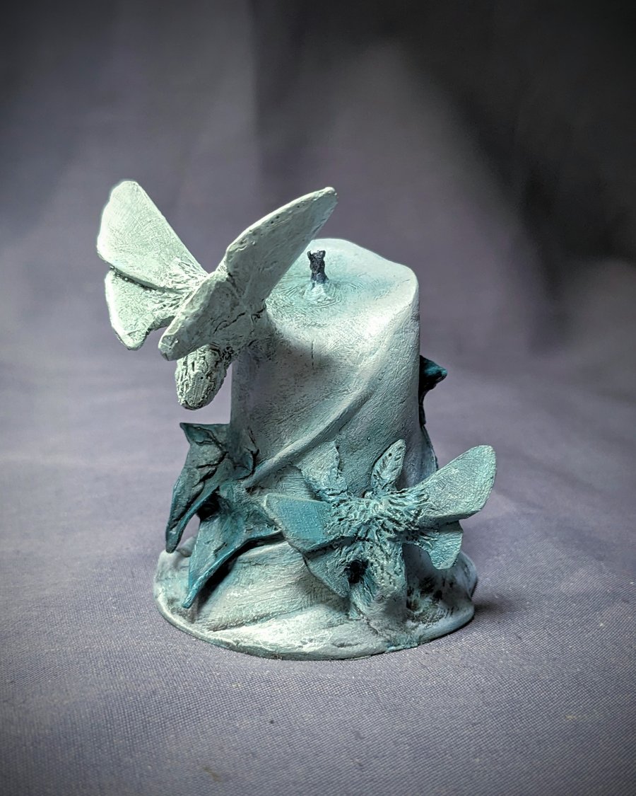 Unlit v - small, haunting, ethereal moth, flower and candle sculpture