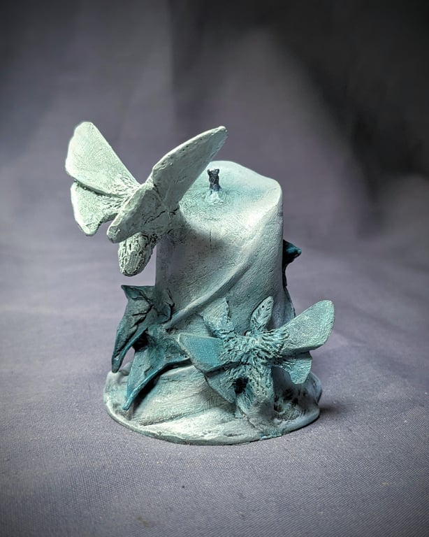 Unlit v - small, haunting, ethereal moth, flower and candle sculpture
