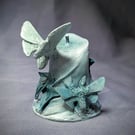 Unlit v - small, haunting, ethereal moth, flower and candle sculpture