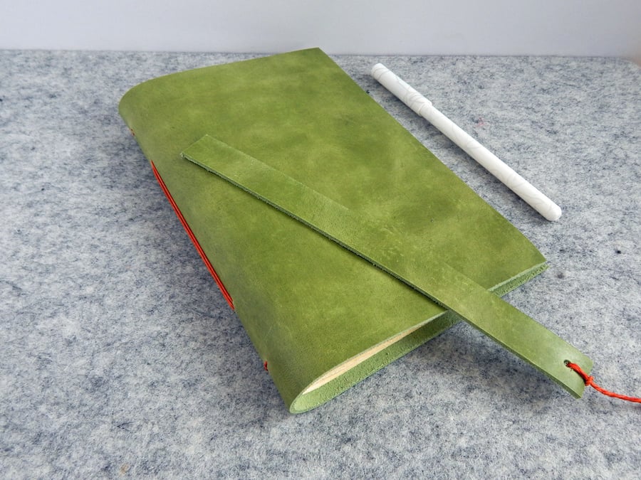 Green Leather Journal. Calf leather in light green with orange binding. 