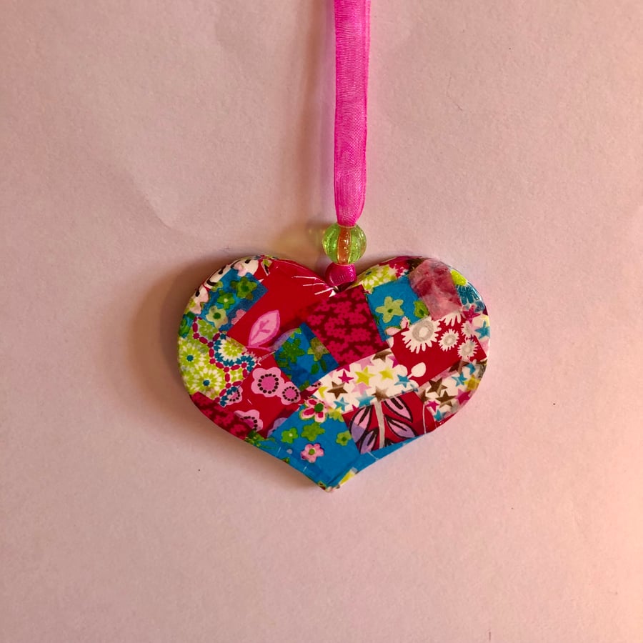 Colourful decopatched wooden heart