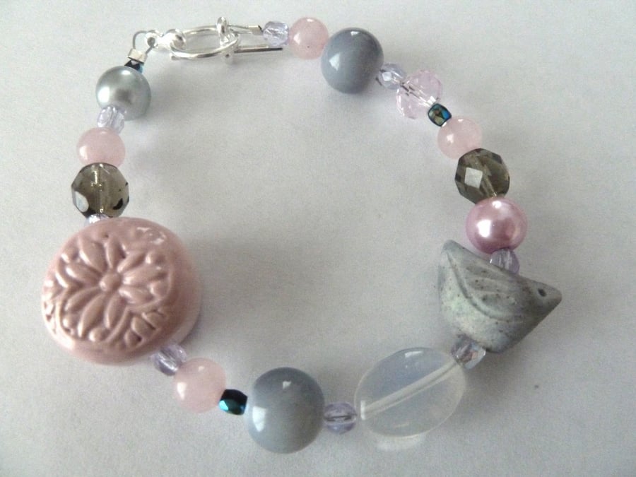 grey and pink ceramic bird bracelet