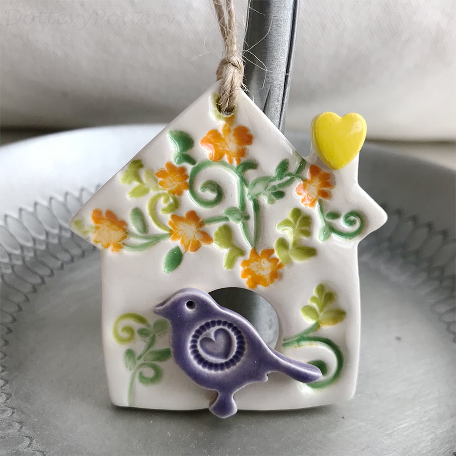 Small Ceramic bird house decoration with pottery bird